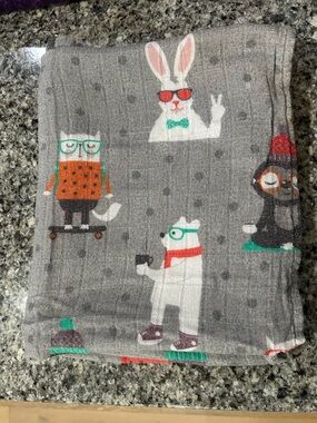 Tula Baby Gray Animal Print Swaddle Blanket with Teal and Red Accents